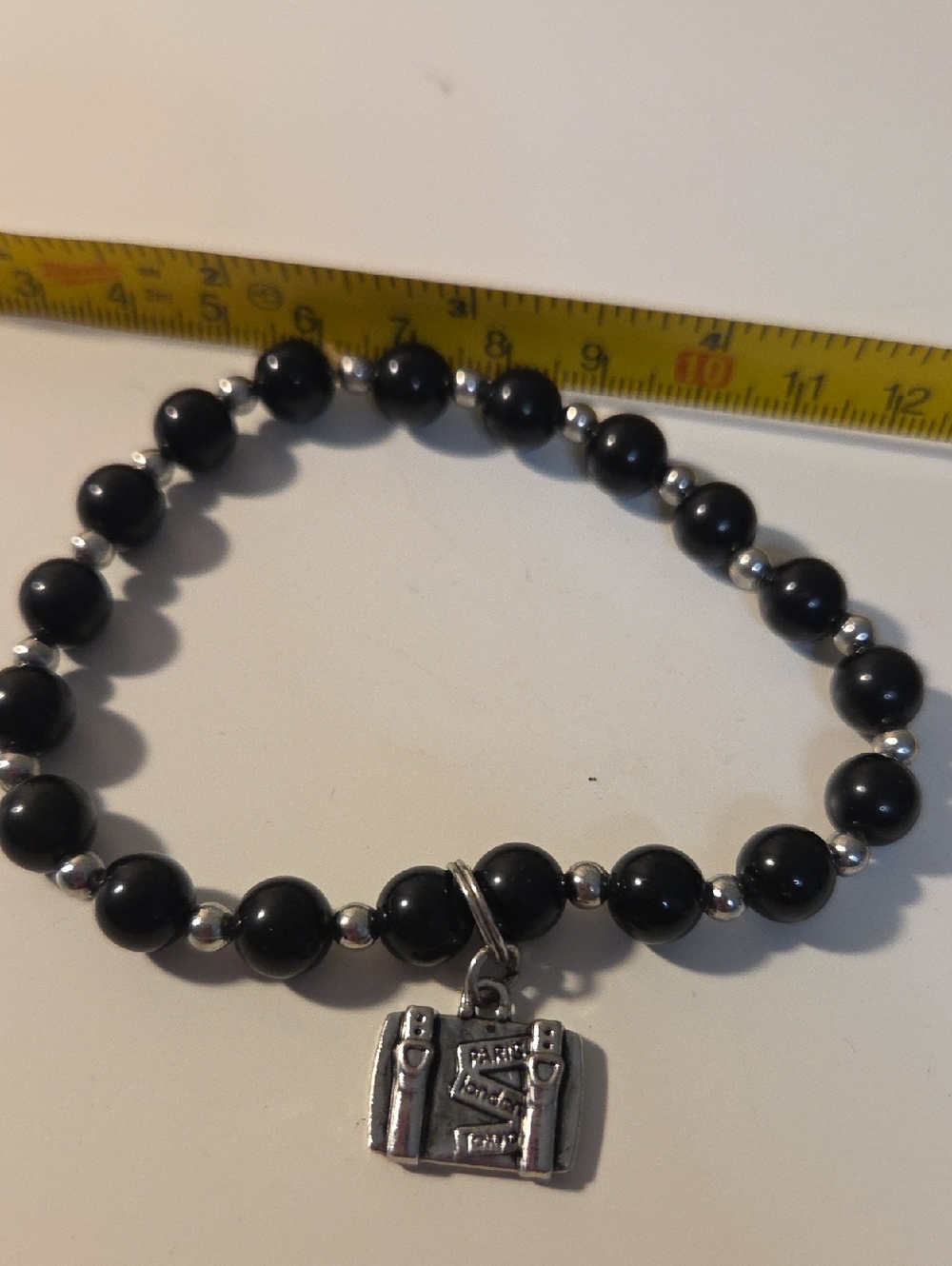 Black Beaded Bracelet with Silver Accent Charm